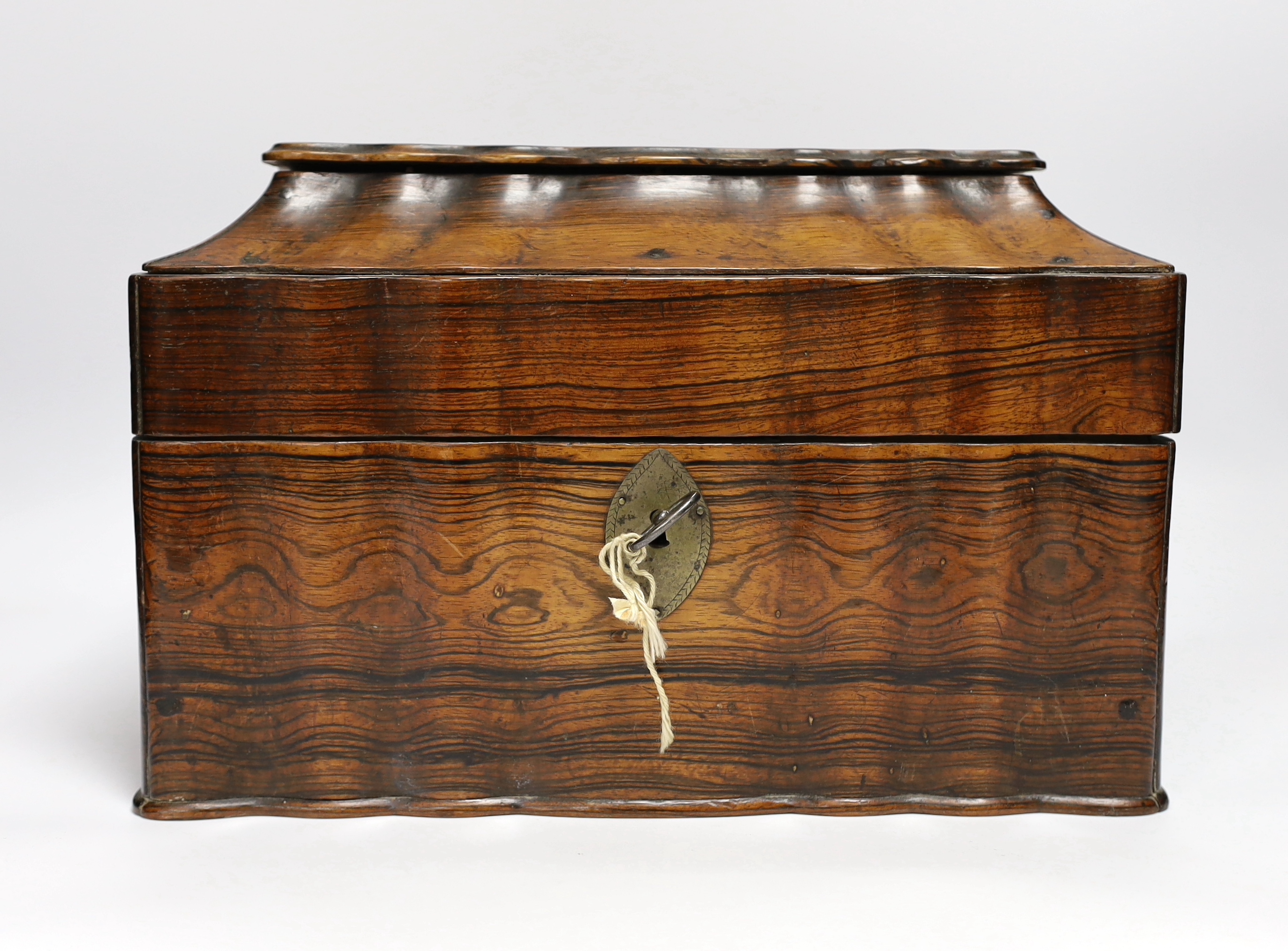 A Ceylonese calamander tea caddy, c.1820, with four internal compartments and key, 29cm wide